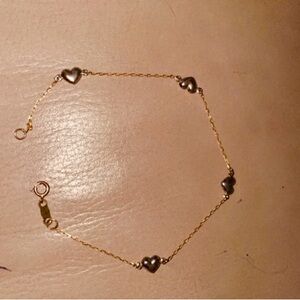 10k gold heart bracelet.